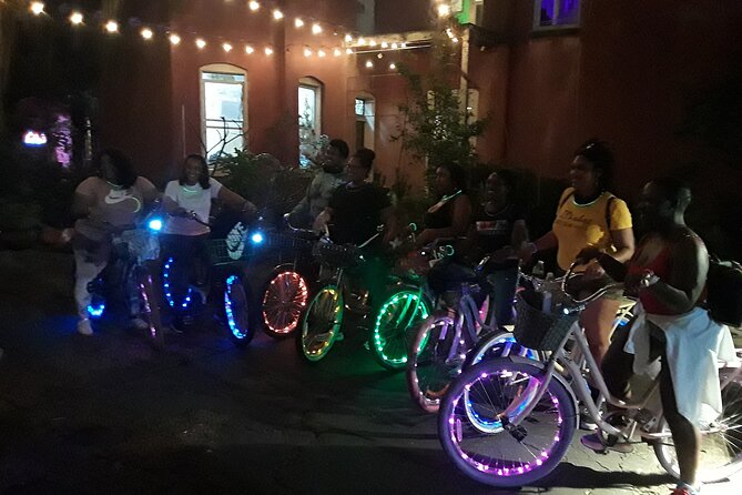 Music Party Bike Ride - Stop 1: the National WWII Museum battleship building at night