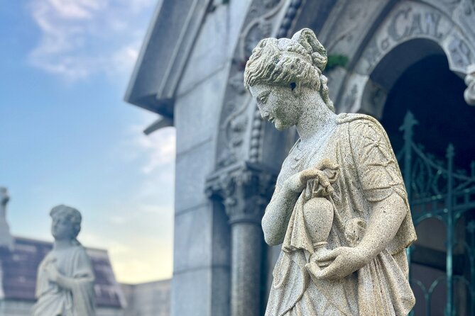 New Orleans Metairie Cemetery Tour: Millionaires and Mausoleums - Reading the tombs: symbols, architecture, and burial customs
