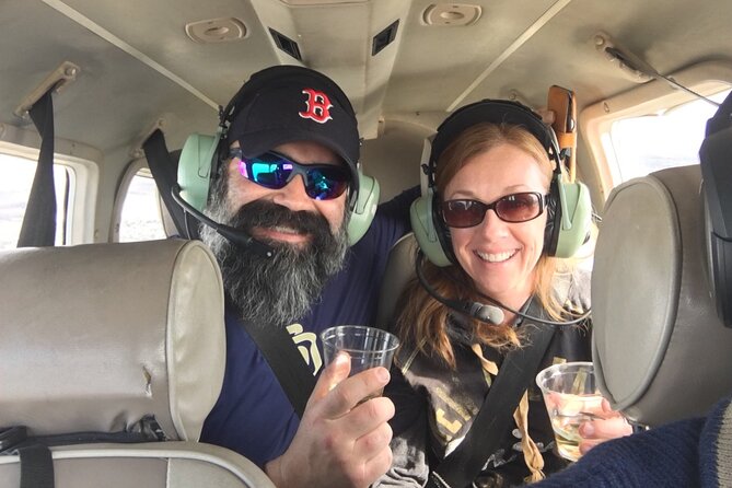 New Orleans VIP Sightseeing Flight with Champagne & Chocolates or Wine & Cheese - Superdome Circles and the Smoothie King Center: A Quick Detour Into the Modern City