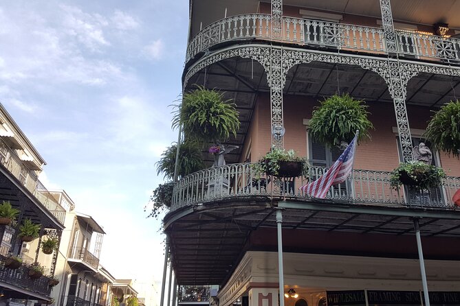 Small Group Local's Guide to the French Quarter Tour - Bourbon Street: party energy with historical roots